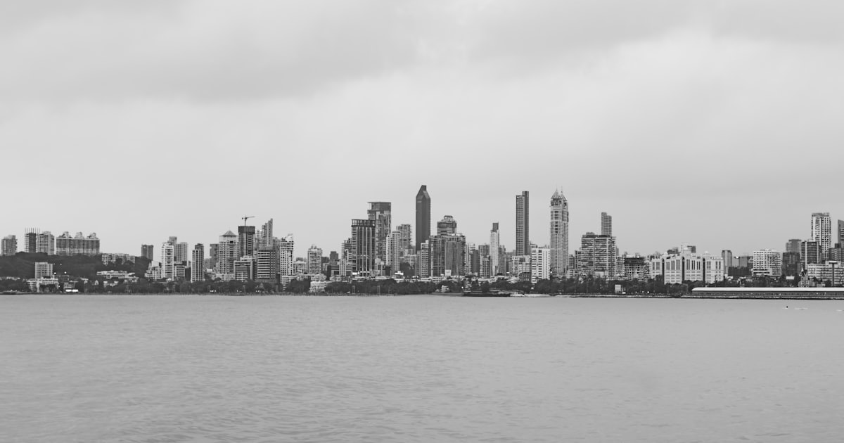 Tricity skyline with high-rise residential towers at dusk