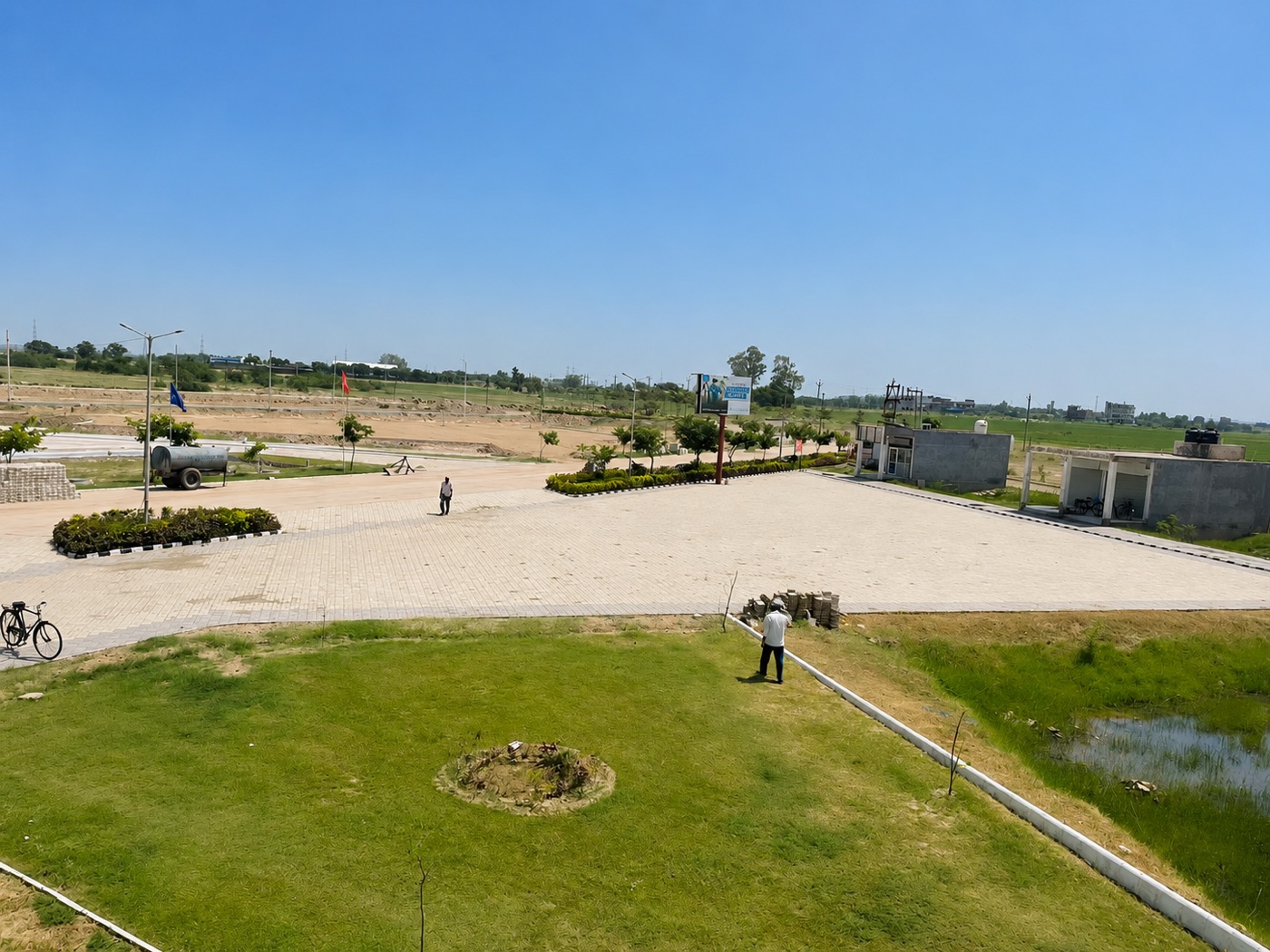 Signature City Mohali entrance plaza and landscaped greens Signature City