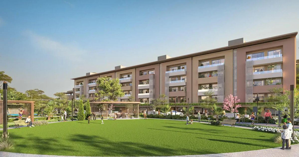 Render of Gulnaar Serene low-rise residential blocks around a landscaped central lawn, Zirakpur